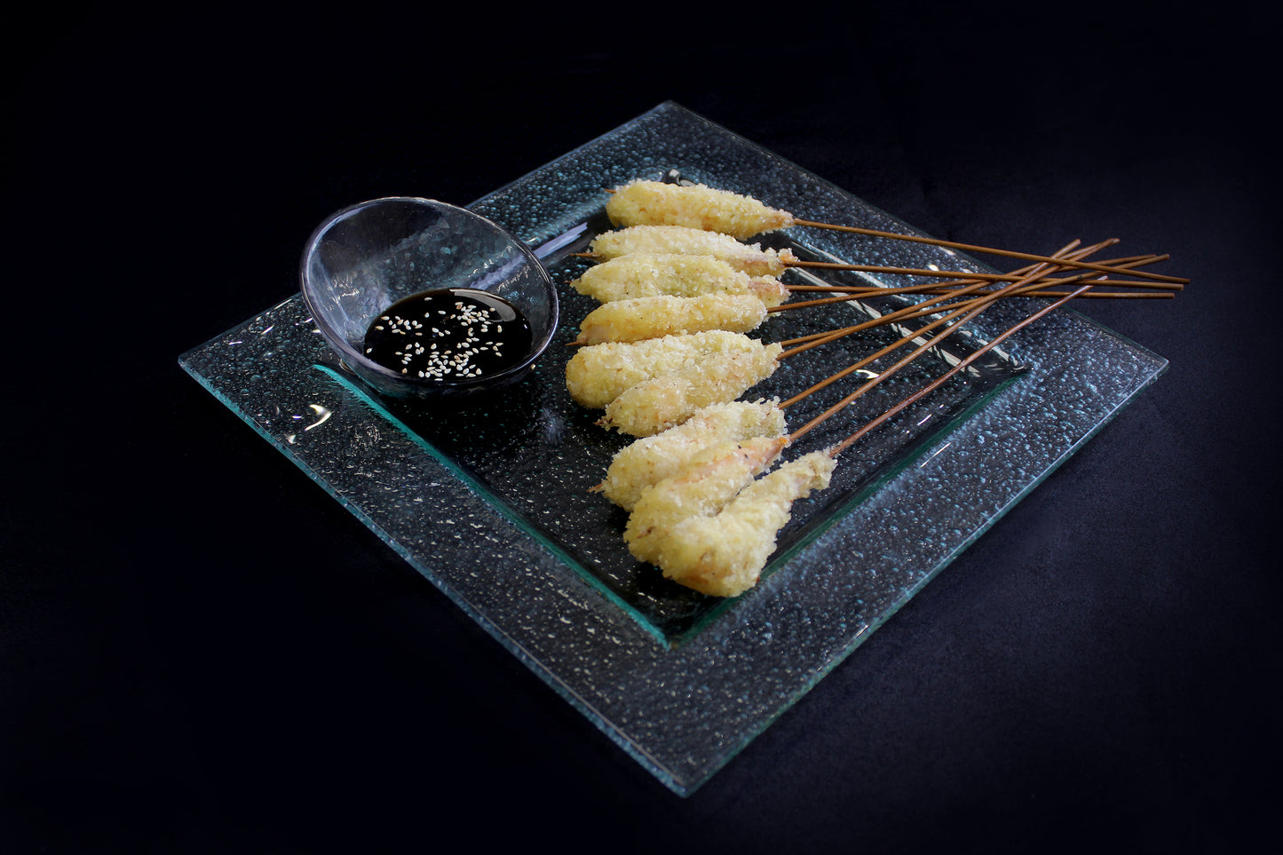 Brochetas de camarón coco